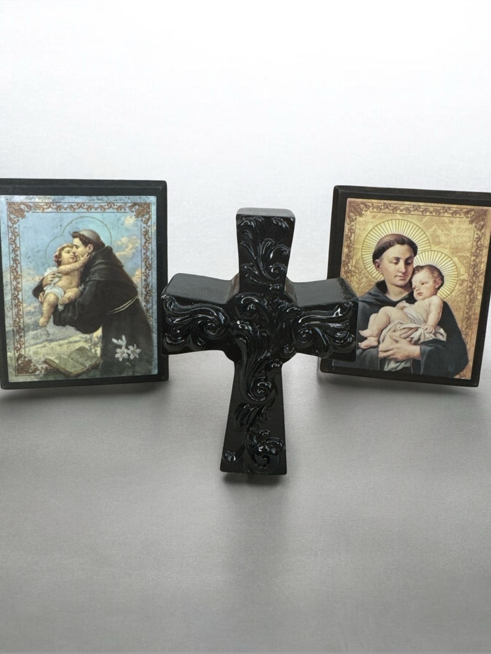Black Decorative Resin Cross with Ornate Scrollwork and 2 Christian Frames